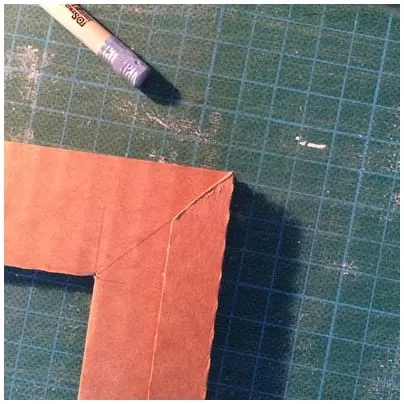 Angle de la bande de carton