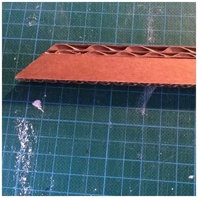 Angle de la bande de dentelle de carton